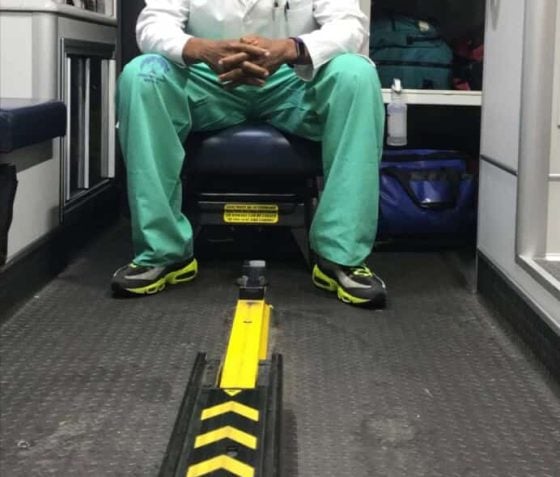 Dr. Geoffrey Mount Varner, ER physician and decision-making keynote speaker, in an ambulance